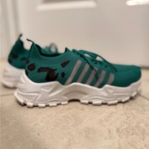 Green and White Running Shoes